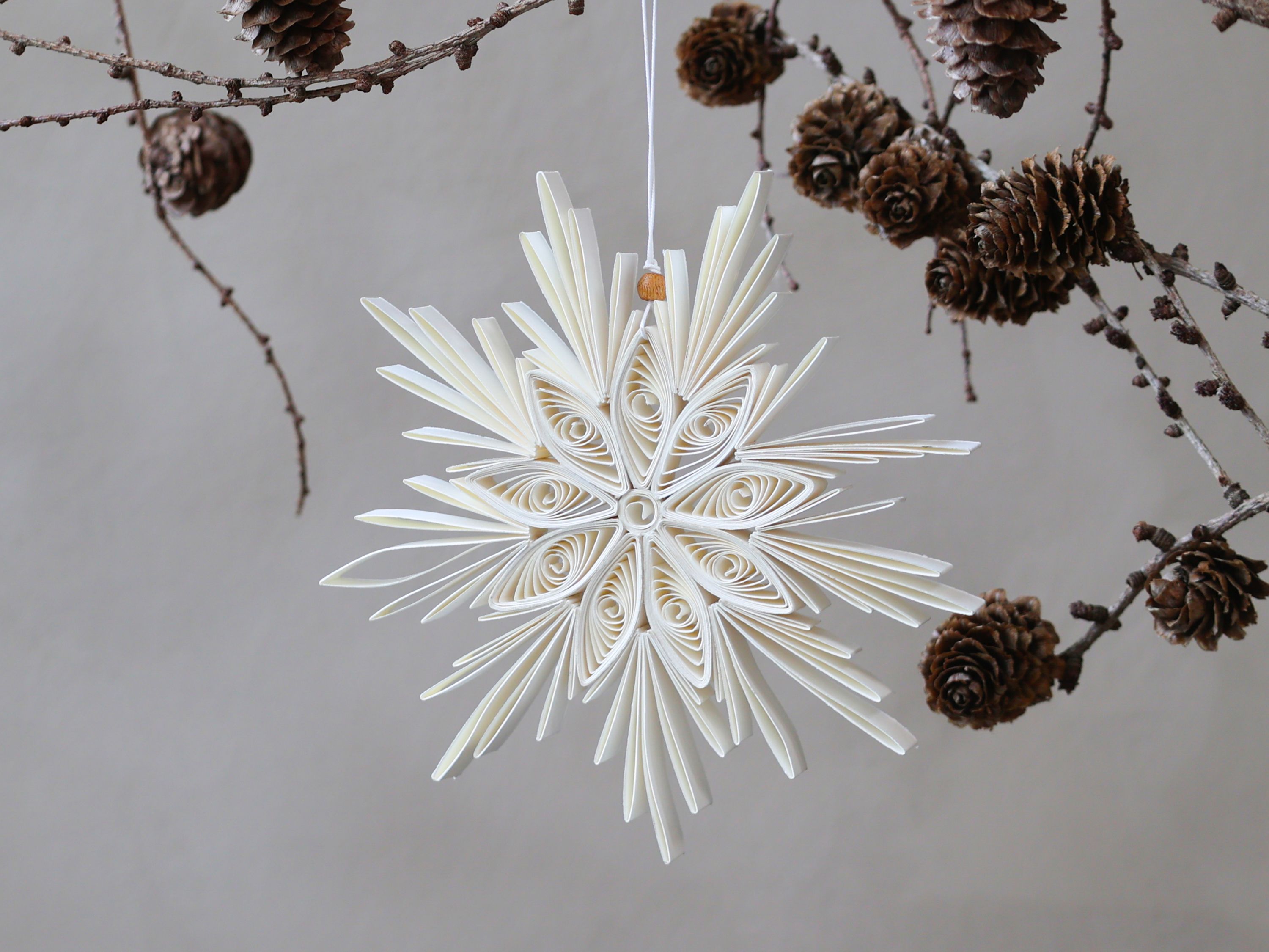 Stern aus Papier, creme, 14 cm Durchmesser