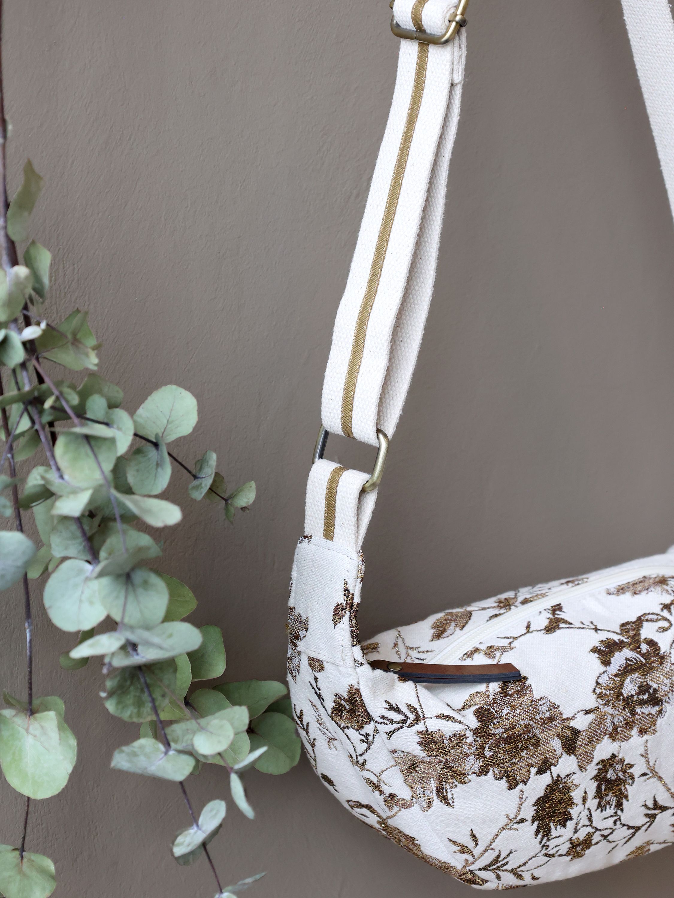 Gürteltasche Damen Creme mit Goldmuster
